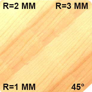 JSO Wendeplatten-Multifunktionsfräser Anwendungsbeispiel: Massivholz-Musterstück mit vier verschiedenen Kantenprofilen (45 Grad Fase, Radius R1, R2, R3), erzeugt durch Messerwechsel am modularen Fräserkörper.